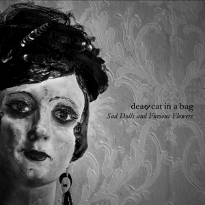 Dead Cat In a Bag – Sad Dolls and Furious Flowers